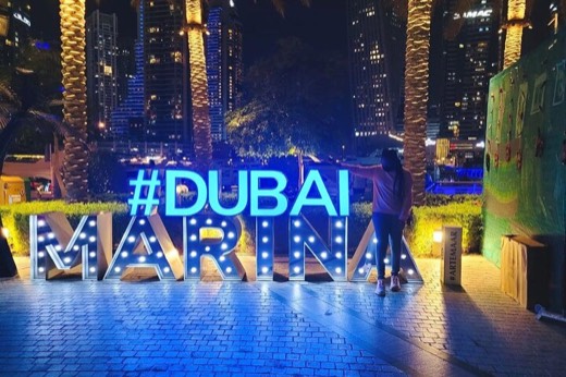#Dubai Marina sign lit at night