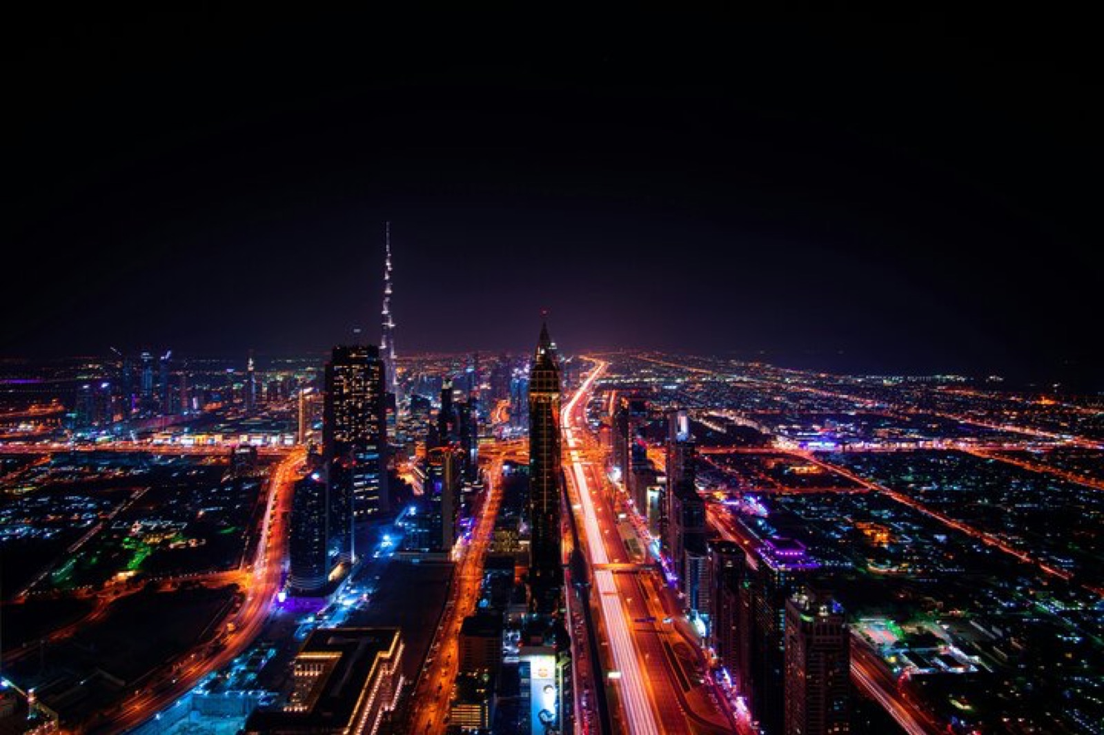 Sheikh Zayed Road and Downtown Dubai from above at night