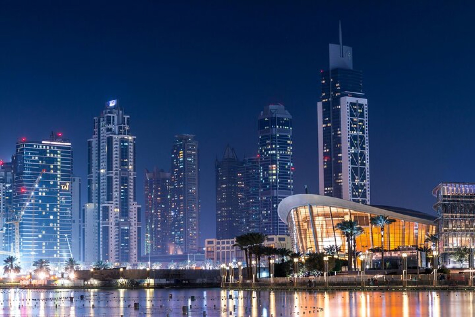 Downtown Dubai towers and Dubai Opera at night